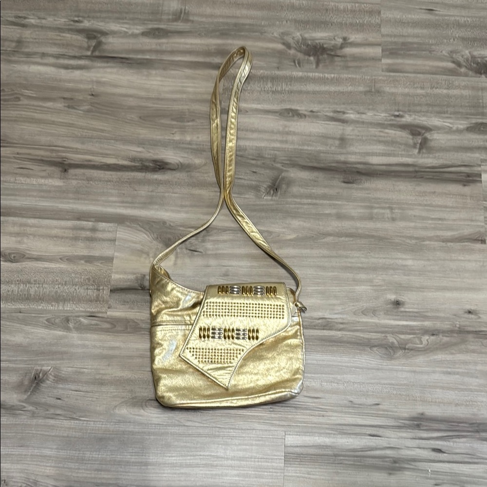 VTG Gold Crossbody Bag with Adjustable Strap and Simple Design.